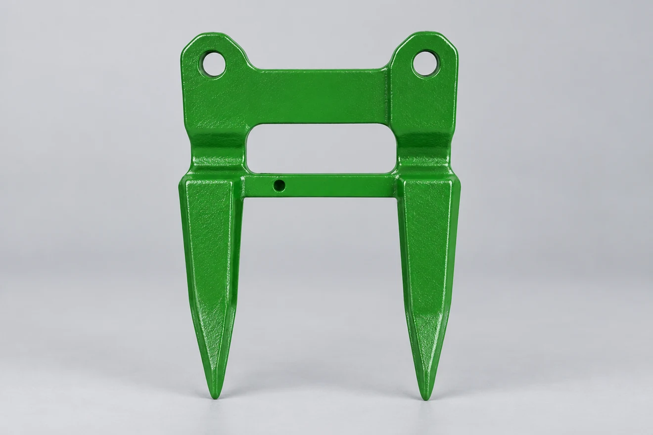 Two-prong knife-guard form with distinct mounting and working regions.