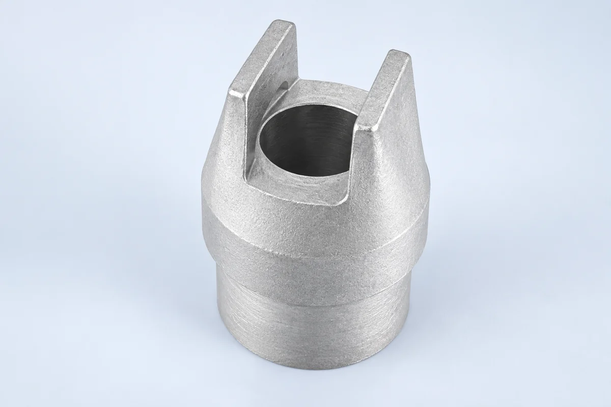 Fork-ended cylindrical component with two raised ears
